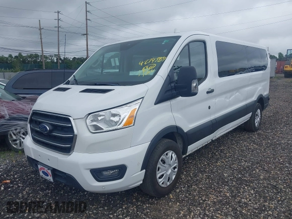2020 Ford Transit Passenger XL with VIN 1FBAX2Y87LKA09619, listed as a IAAI auction lot 42743359 with 79,822 mi miles and . Bid and sale history available at DreamBid. Image 18.