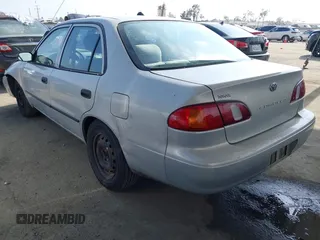 2000 Toyota Corolla VE with VIN 1NXBR12E6YZ393077, listed as a IAAI auction lot 42111914 with 181,056 mi miles and . Bid and sale history available at DreamBid. Image 3.