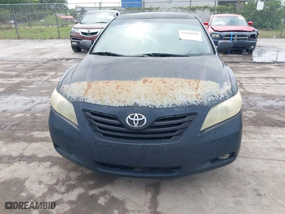 2007 Toyota Camry CE with VIN 4T1BE46K27U513940, listed as a IAAI auction lot 42108691 with 331,435 mi miles. Bid and sale history available at carsss.com. Image 6.
