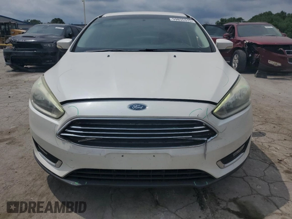 2015 Ford Focus Titanium с VIN 1FADP3J26FL333542, выставлен на аукционе Copart как лот 59855315 с пробегом 116 763 миль миль и Чистый • Clean title. История ставок и продаж доступна на DreamBid. Изображение 5.