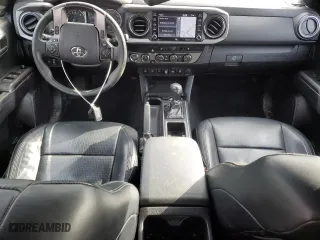 2021 Toyota Tacoma 4WD SR with VIN 3TMCZ5AN7MM371380, listed as a Copart auction lot 49846625 with 57,553 mi miles and Salvage Title. Bid and sale history available at carsss.com. Image 8.