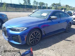 2024 BMW i4 M50 z VIN WBY33AW09RFS60679, wystawiony jako IAAI lot #41983706 z przebiegiem 2665 mil mil oraz . Historia ofert i sprzedaży dostępna na DreamBid. Obrazek 22.