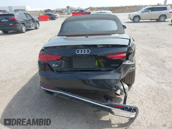 2020 Audi A5 Cabriolet Premium z VIN WAUWNGF50LN000334, wystawiony jako IAAI lot #41919556 z przebiegiem 56 494 mil mil oraz . Historia ofert i sprzedaży dostępna na DreamBid. Obrazek 6.