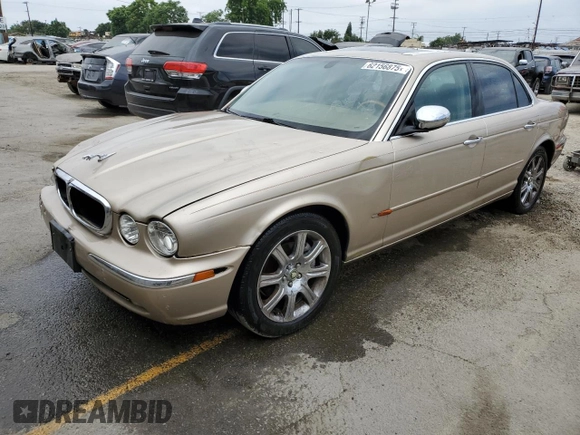2004 Jaguar XJ with VIN SAJEA74C84SG03857, listed as a Copart auction lot 62156875 with 92,649 mi miles and Salvage title. Bid and sale history available at DreamBid. Image 1.