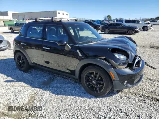 2015 MINI Countryman with VIN WMWZB3C50FWM33153, listed as a Copart auction lot 88238955 with 88,744 mi miles and Salvage Title. Bid and sale history available at DreamBid. Image 4.