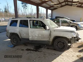 2015 Jeep Patriot Limited with VIN 1C4NJRCB9FD177233, listed as a IAAI auction lot 41443612 with 149,096 mi miles and . Bid and sale history available at DreamBid. Image 14.