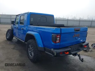 2024 Jeep Gladiator Mojave X z VIN 1C6JJTEG5RL121313, wystawiony jako IAAI lot #41013599 z przebiegiem 2 952 mil mil oraz . Historia ofert i sprzedaży dostępna na DreamBid. Obrazek 3.