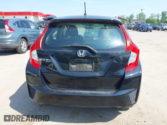 2015 Honda Fit LX z VIN 3HGGK5H51FM724566, wystawiony jako IAAI lot #42151755 z przebiegiem 168 744 mil mil oraz . Historia ofert i sprzedaży dostępna na DreamBid. Obrazek 16.