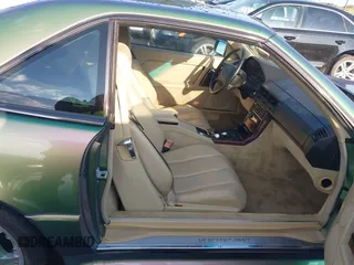 1990 Mercedes-Benz 500 z VIN WDBFA66E7LF005953, wystawiony jako IAAI lot #42224846 z przebiegiem 87 388 mil mil oraz . Historia ofert i sprzedaży dostępna na DreamBid. Obrazek 5.