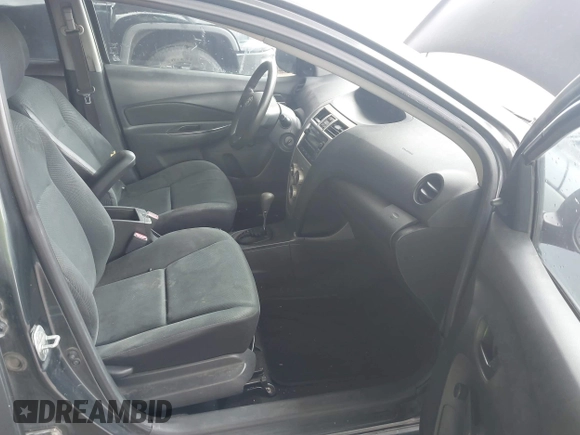 2009 Toyota Yaris with VIN JTDBT903191301642, listed as a IAAI auction lot 42111524 with 224,048 mi miles and . Bid and sale history available at DreamBid. Image 5.