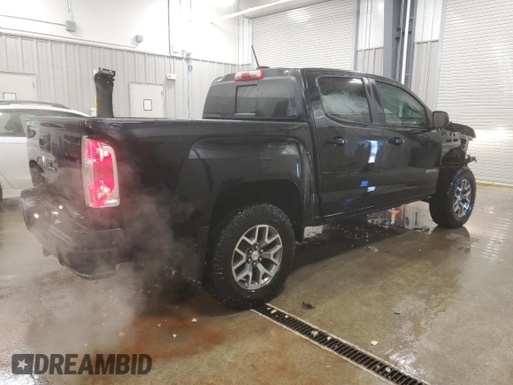2021 GMC Canyon 4WD AT4 w/Cloth with VIN 1GTG6FEN0M1106579, listed as a Copart auction lot 81330184 with 29,630 mi miles and Salvage Title. Bid and sale history available at carsss.com. Image 3.