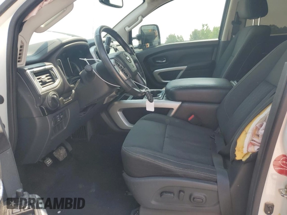 2018 Nissan Titan SV with VIN 1N6AA1E5XJN509882, listed as a Copart auction lot 60162995 with 149,352 mi miles and Salvage title. Bid and sale history available at DreamBid. Image 7.