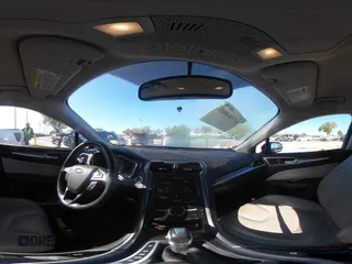 2016 Ford Fusion Titanium Hybrid with VIN 3FA6P0RU8GR127140, listed as a IAAI auction lot 41750405 with 110,861 mi miles. Bid and sale history available at carsss.com. Image 24.