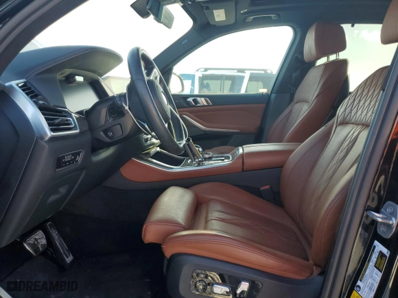 2022 BMW X5 M50i with VIN 5UXJU4C07N9M64559, listed as a Copart auction lot 83065504 with NaN miles and Salvage Title. Bid and sale history available at carsss.com. Image 7.