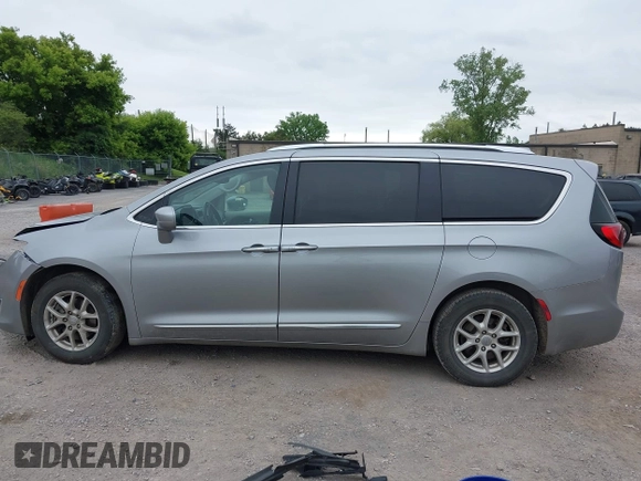 2020 Chrysler Pacifica Touring L with VIN 2C4RC1BG2LR127986, listed as a IAAI auction lot 42419518 with 107,618 mi miles and . Bid and sale history available at DreamBid. Image 14.