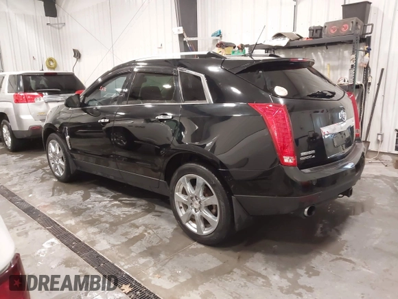 2011 Cadillac SRX Performance Collection with VIN 3GYFNEEY9BS675746, listed as a IAAI auction lot 41735676 with 113,079 mi miles and . Bid and sale history available at carsss.com. Image 3.