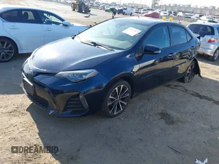 2019 Toyota Corolla L with VIN 5YFBURHE7KP922064, listed as a IAAI auction lot 41977741 with 54,896 mi miles and . Bid and sale history available at DreamBid. Image 17.