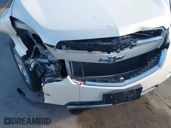 2013 Chevrolet Equinox LTZ with VIN 1GNFLGEK0DZ122077, listed as a IAAI auction lot 41920558 with 163,199 mi miles and . Bid and sale history available at DreamBid. Image 6.