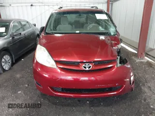 2009 Toyota Sienna CE with VIN 5TDZK23C89S265150, listed as a IAAI auction lot 42079867 with 211,467 mi miles. Bid and sale history available at carsss.com. Image 12.
