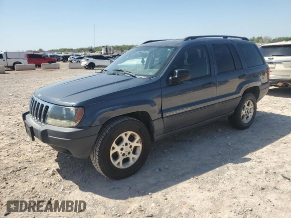 2003 Jeep Grand Cherokee Laredo with VIN 1J4GX48S83C504543, listed as a Copart auction lot 52723835 with 220,574 mi miles and Clean Title. Bid and sale history available at carsss.com. Image 1.