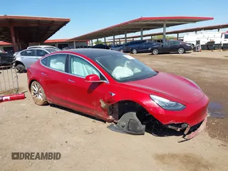 2018 Tesla Model 3 Long Range Battery with VIN 5YJ3E1EA3JF163654, listed as a IAAI auction lot 42193809 with Not Provided miles and . Bid and sale history available at DreamBid. Image 1.