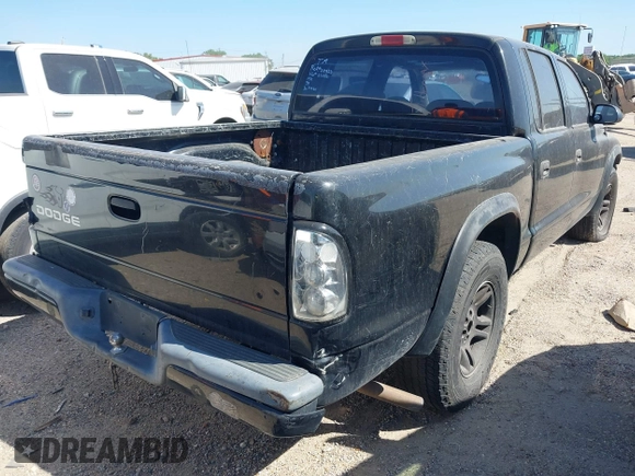 2003 Dodge Dakota Sport with VIN 1D7HL38X63S228581, listed as a IAAI auction lot 41835200 with 273,562 mi miles and . Bid and sale history available at DreamBid. Image 4.