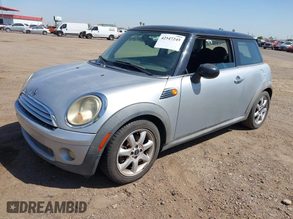 2007 MINI Hardtop with VIN WMWMF33547TL77235, listed as a IAAI auction lot 42547245 with 144,179 mi miles and . Bid and sale history available at DreamBid. Image 2.