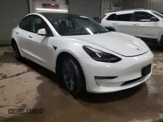 2022 Tesla Model 3 Long Range with VIN 5YJ3E1EB5NF334516, listed as a Copart auction lot 43247755 with 23,412 mi miles and Salvage Title. Bid and sale history available at DreamBid. Image 4.