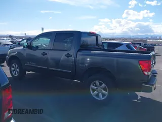 2010 Nissan Titan XE with VIN 1N6BA0EJ5AN304045, listed as a IAAI auction lot 41794718 with 297,551 mi miles. Bid and sale history available at carsss.com. Image 14.