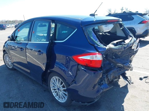 2016 Ford C-Max Energi SEL with VIN 1FADP5CU9GL102758, listed as a IAAI auction lot 41989630 with 103,410 mi miles. Bid and sale history available at carsss.com. Image 3.