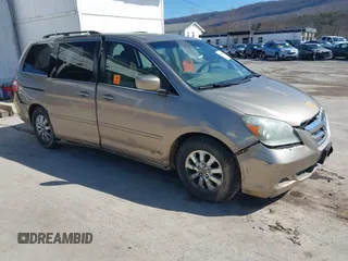 2006 Honda Odyssey EX z VIN 5FNRL384X6B459148, wystawiony jako IAAI lot #41747616 z przebiegiem 158 995 mil mil oraz . Historia ofert i sprzedaży dostępna na DreamBid. Obrazek 1.