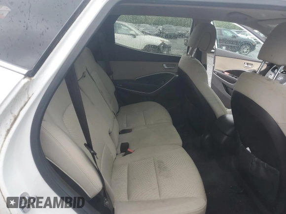 2016 Hyundai Santa Fe z VIN 5XYZTDLB6GG338557, wystawiony jako Copart lot #57899185 z przebiegiem 91 702 mil mil oraz Czysty tytuł • Clean title. Historia ofert i sprzedaży dostępna na DreamBid. Obrazek 10.