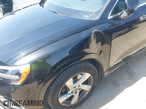 2019 Audi Q3 Premium with VIN WA1AECF33K1086047, listed as a IAAI auction lot 41905218 with 51,802 mi miles. Bid and sale history available at carsss.com. Image 6.