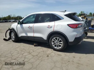 2021 Ford Escape SE with VIN 1FMCU0G66MUA09887, listed as a Copart auction lot 54421145 with 33,707 mi miles and Salvage title. Bid and sale history available at DreamBid. Image 2.