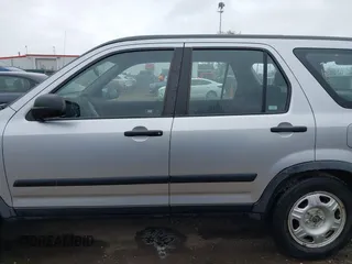 2006 Honda CR-V LX with VIN JHLRD78536C035954, listed as a IAAI auction lot 42043220 with 250,337 mi miles and . Bid and sale history available at carsss.com. Image 13.