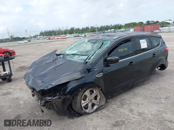 2015 Ford Escape SE with VIN 1FMCU0G98FUA80408, listed as a IAAI auction lot 41955818 with 129,908 mi miles. Bid and sale history available at carsss.com. Image 2.