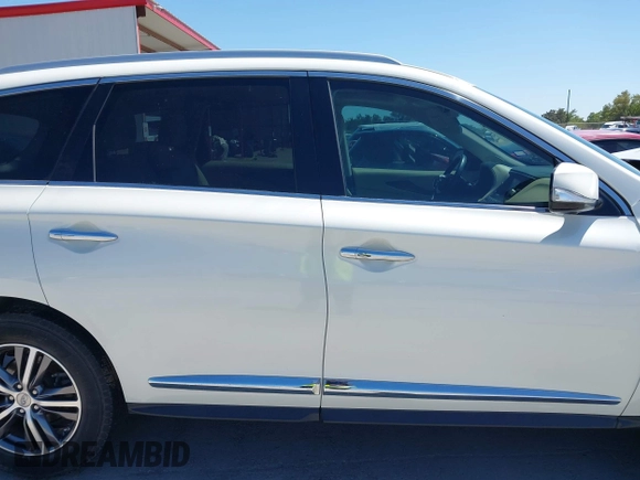 2016 Infiniti QX60 with VIN 5N1AL0MMXGC511972, listed as a IAAI auction lot 41979787 with 127,298 mi miles and . Bid and sale history available at DreamBid. Image 13.