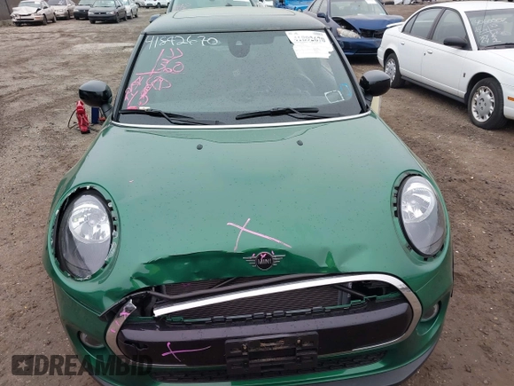 2021 MINI Hardtop Cooper with VIN WMWXR3C09M2N45834, listed as a IAAI auction lot 41892670 with 10,512 mi miles and . Bid and sale history available at DreamBid. Image 12.