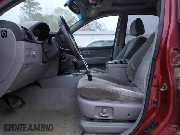 2006 Kia Sorento LX with VIN KNDJD733165550228, listed as a Copart auction lot 87581895 with 189,561 mi miles and Salvage Title. Bid and sale history available at DreamBid. Image 7.