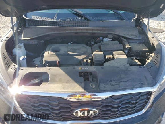 2019 Kia Sorento L z VIN 5XYPG4A31KG585341, wystawiony jako Copart lot #53194145 z przebiegiem 67 451 mil mil oraz Szkoda całkowita • Salvage title. Historia ofert i sprzedaży dostępna na DreamBid. Obrazek 12.