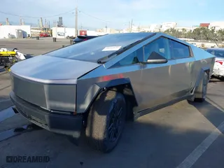 2024 Tesla Cybertruck with VIN 7G2CEHED9RA047674, listed as a IAAI auction lot 41118625 with 1,323 mi miles. Bid and sale history available at carsss.com. Image 2.