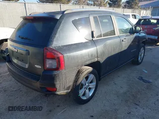 2014 Jeep Compass Latitude with VIN 1C4NJCEB3ED560058, listed as a IAAI auction lot 41470125 with 116,319 mi miles. Bid and sale history available at carsss.com. Image 4.