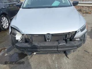 2014 Volkswagen Jetta S with VIN 3VW2K7AJ7EM313535, listed as a IAAI auction lot 41786112 with 63,694 mi miles and . Bid and sale history available at DreamBid. Image 6.