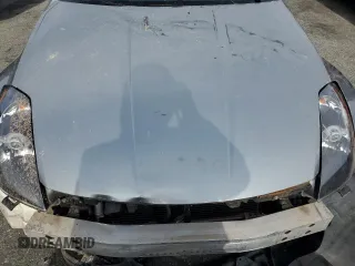 2004 Nissan 350Z Touring z VIN JN1AZ36A44M253626, wystawiony jako Copart lot #79089504 z przebiegiem 138 345 mil mil oraz Szkoda całkowita • Salvage title. Historia ofert i sprzedaży dostępna na DreamBid. Obrazek 11.
