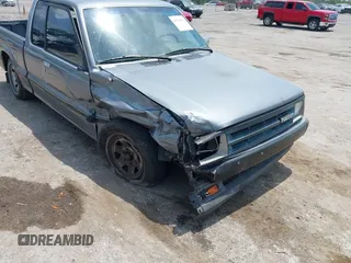 1992 Mazda B-Series Truck with VIN JM2UF313XN0306779, listed as a IAAI auction lot 42104583 with 137,826 mi miles and . Bid and sale history available at DreamBid. Image 6.
