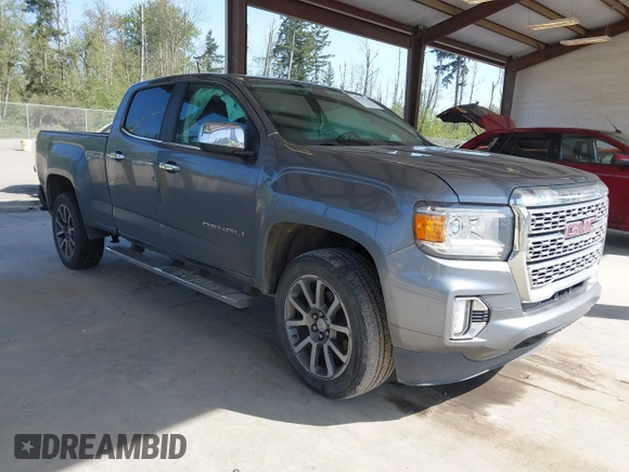 2021 GMC Canyon 4WD Denali with VIN 1GTG6EEN5M1102747, listed as a IAAI auction lot 42121134 with 60,412 mi miles and . Bid and sale history available at DreamBid. Image 1.