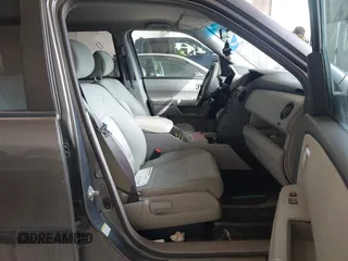 2012 Honda Pilot LX with VIN 5FNYF4H23CB015371, listed as a IAAI auction lot 41852341 with 180,000 mi miles and . Bid and sale history available at carsss.com. Image 5.