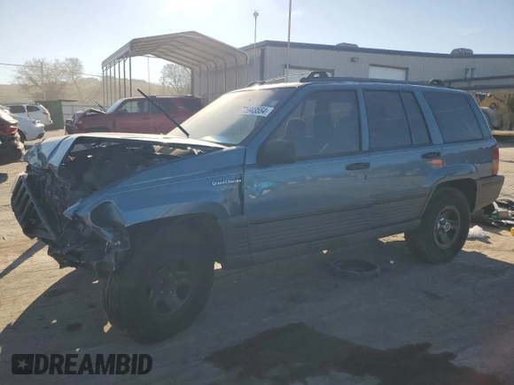 1994 Jeep Grand Cherokee Laredo with VIN 1J4FX58S1RC334178, listed as a Copart auction lot 75943554 with 165,435 mi miles and Clean Title. Bid and sale history available at carsss.com. Image 1.