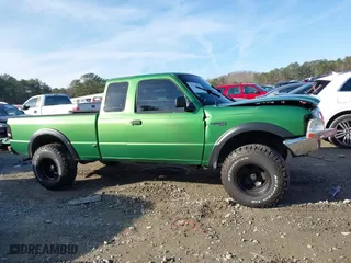 1999 Ford Ranger XLT with VIN 1FTZR15X3XPA13058, listed as a IAAI auction lot 41329263 with 96,926 mi miles. Bid and sale history available at carsss.com. Image 13.