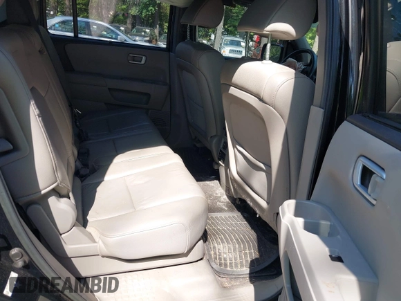 2013 Honda Pilot Touring with VIN 5FNYF3H96DB011470, listed as a IAAI auction lot 42535022 with 201,380 mi miles and . Bid and sale history available at DreamBid. Image 8.